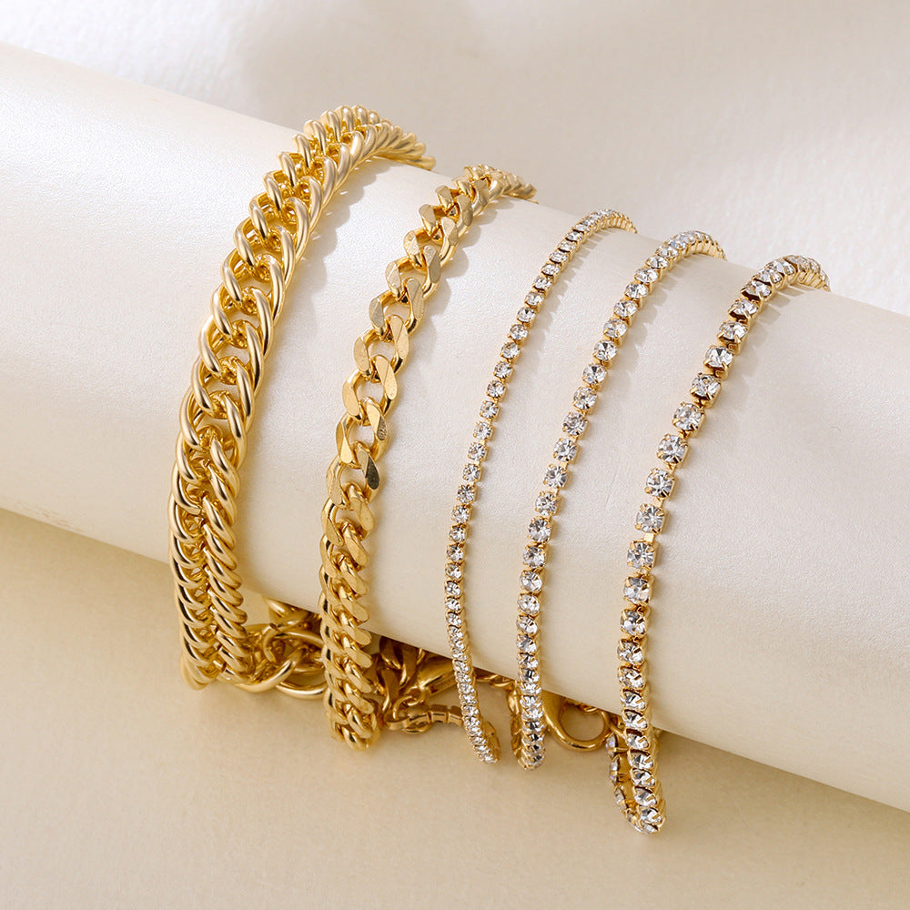 TB Golden Glam Stack: 4-Piece Layered Chain & Crystal Bracelet Set