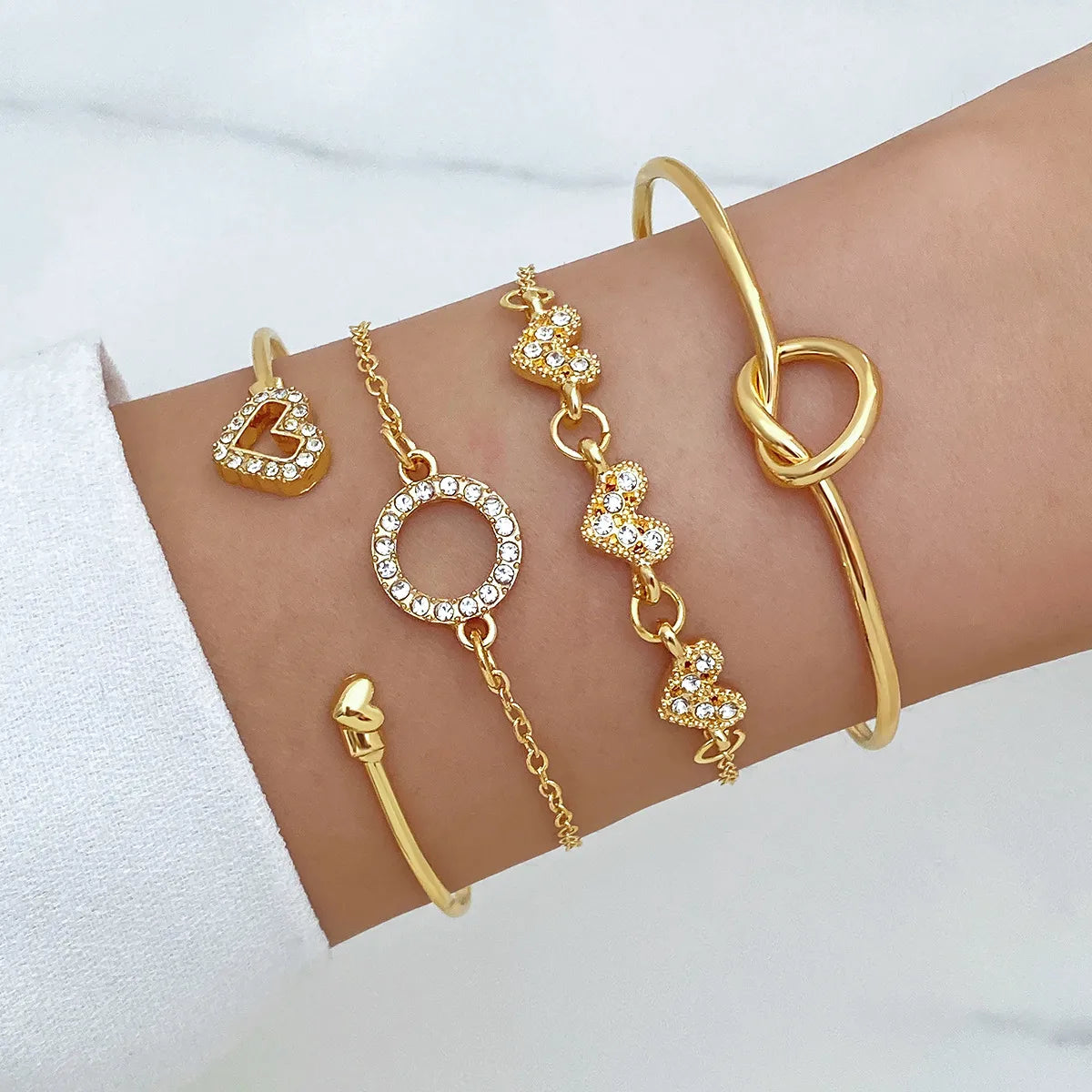 TB Golden Embrace Bracelet Set: Pave Heart & Knot Collection