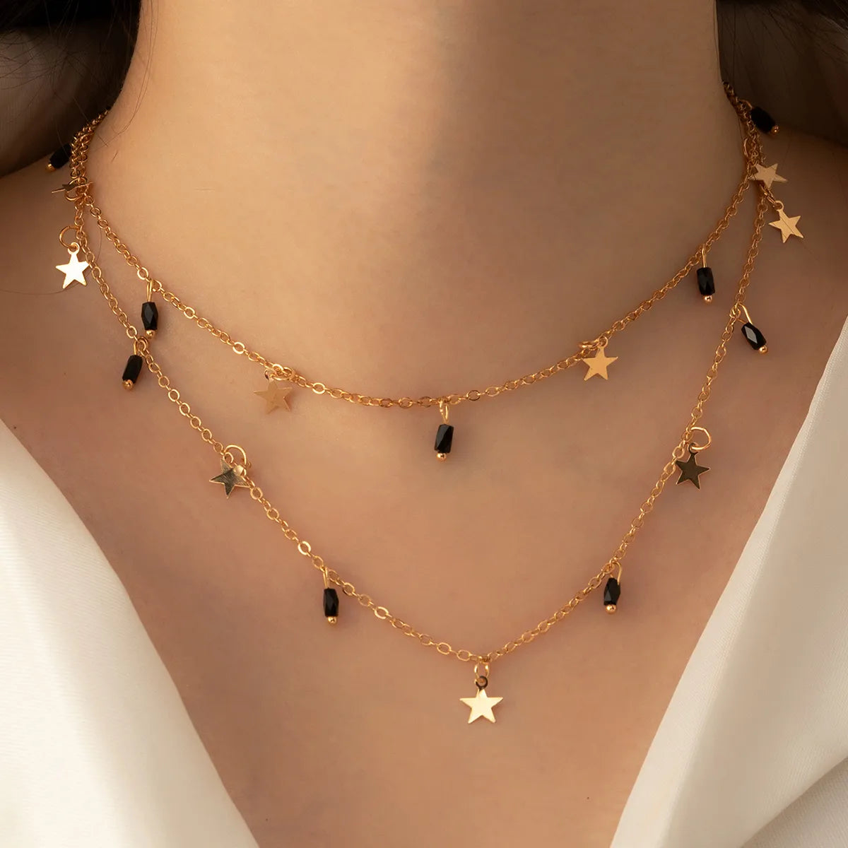 Cosmic Radiance Gold & Obsidian Layered Necklace